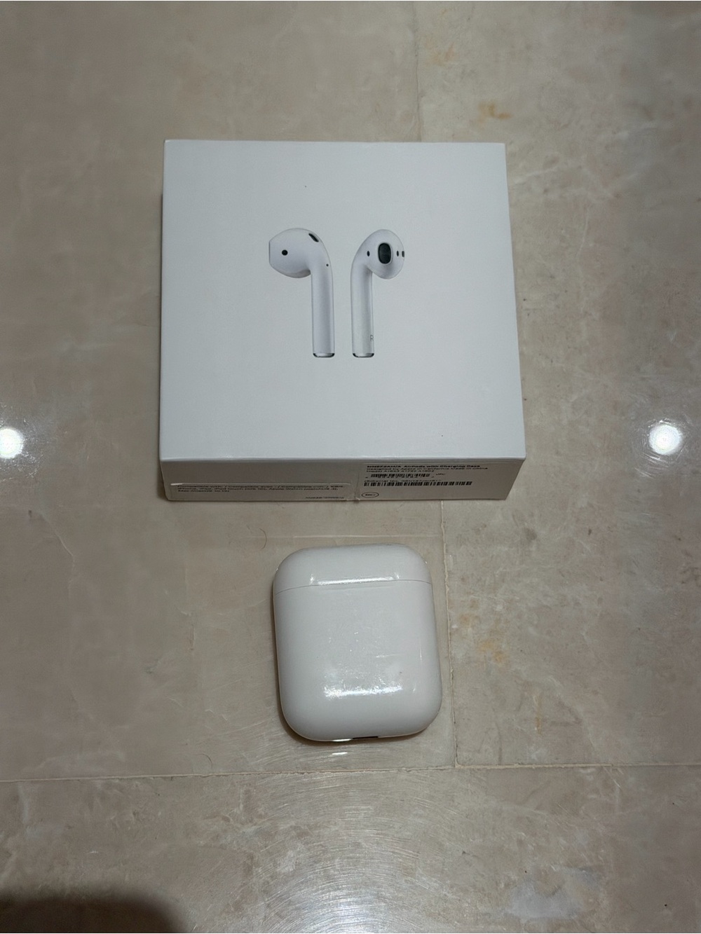 Apple AirPods Wireless Earbuds with Charging Case